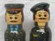 фигурки милиционера и ОМОНовца. Фото с сайта www.nestingdolls.ru